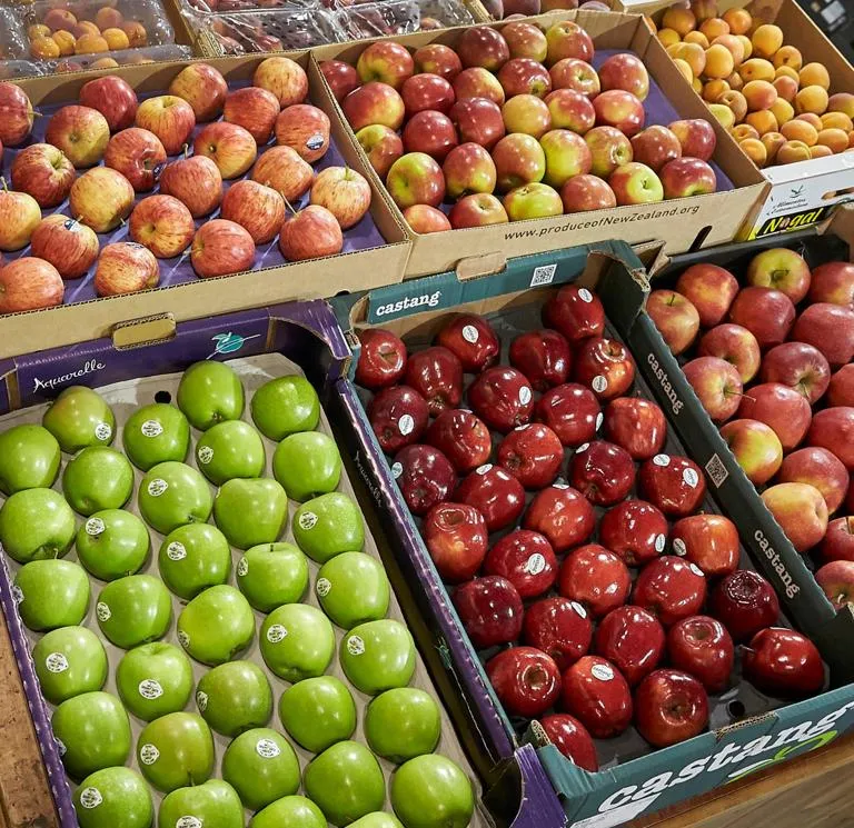 Pallets of various apples