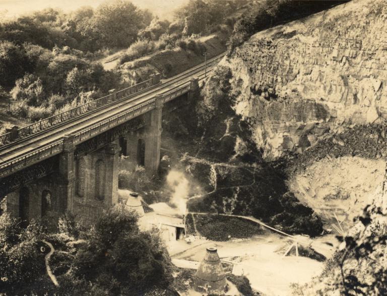 A vintage photo of Riddlesdown quarry and railway bridge