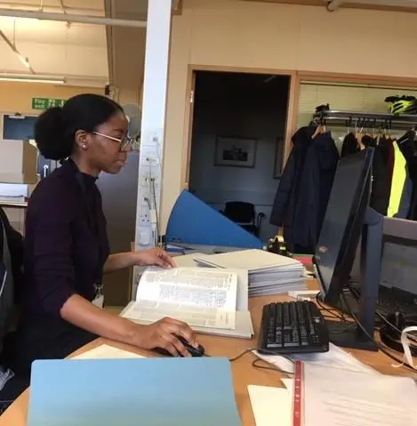 Faustina working on the Huntley Library