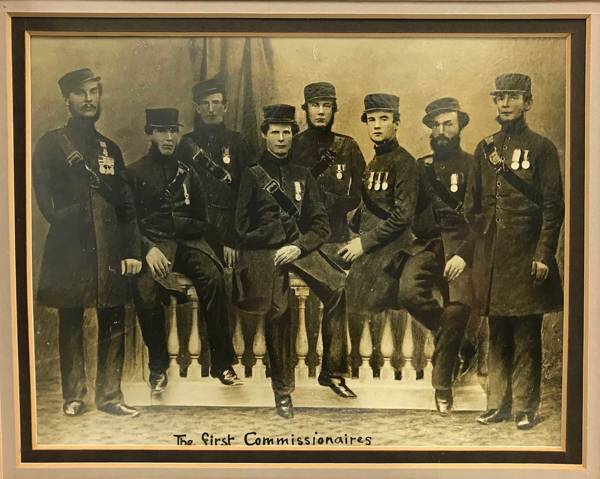 The first eight commissionaires. Crimean War veterans, seven ex-soldiers and one ex-sailor, they were all amputees