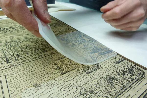 Conservation work being carried out on the Civitas Londinium map in preparation for the exhibition