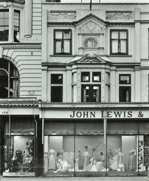 Window display at John Lewis department store in Oxford Street with mannequins in nightwear, 1957