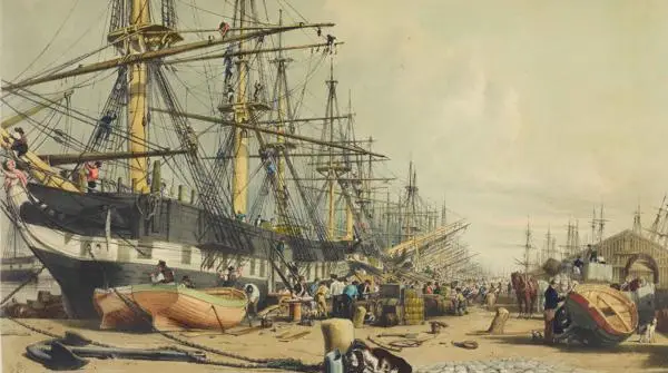 View of West India Dock, showing ships docked, figures making repairs to boats or handling cargo, 1830