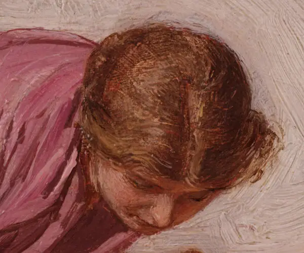 close up on a painting showing a woman's head and face