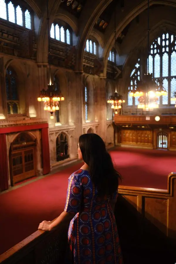 Angela, overlooking the Great Hall from the balcony