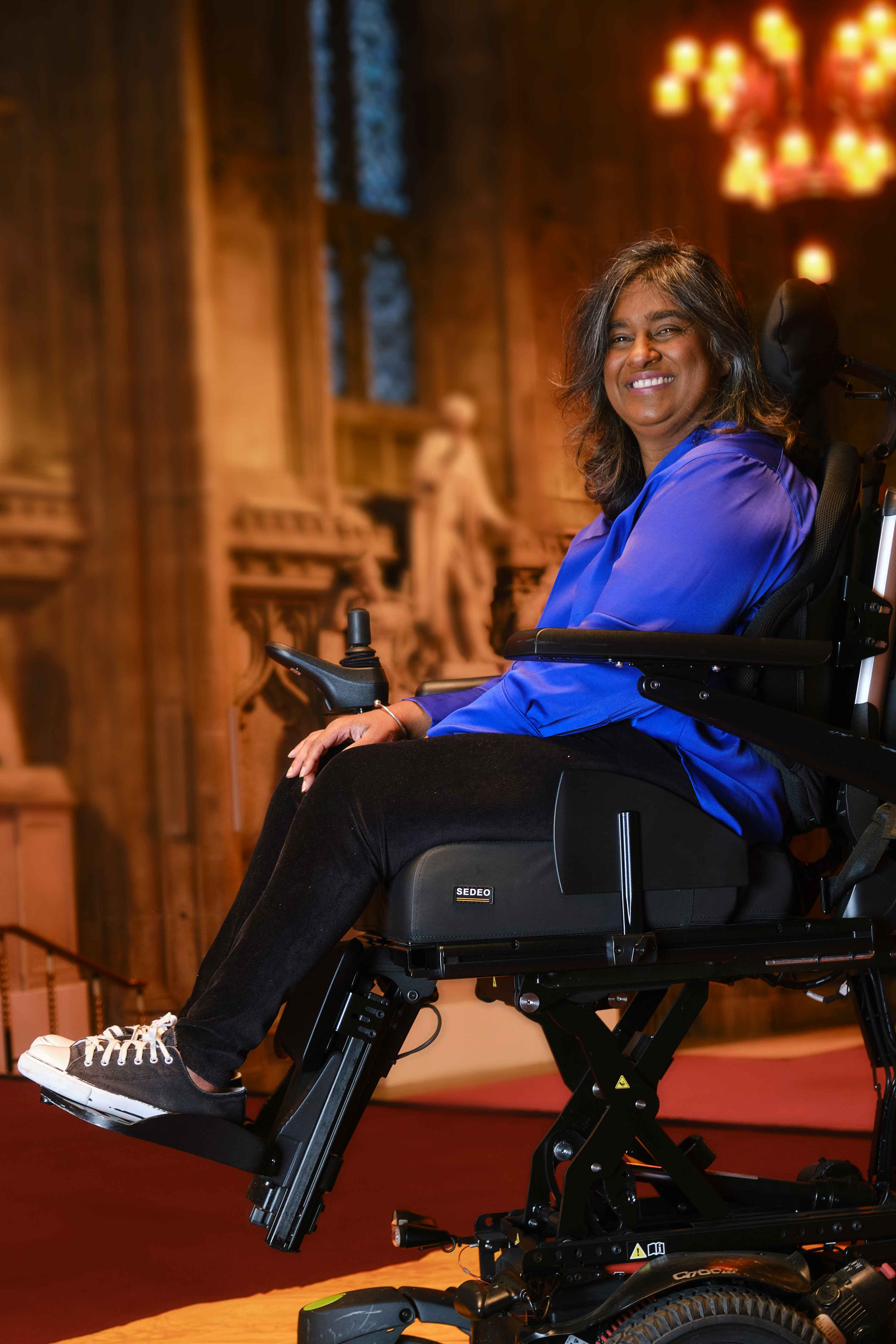 Rosie smiling in the Great Hall